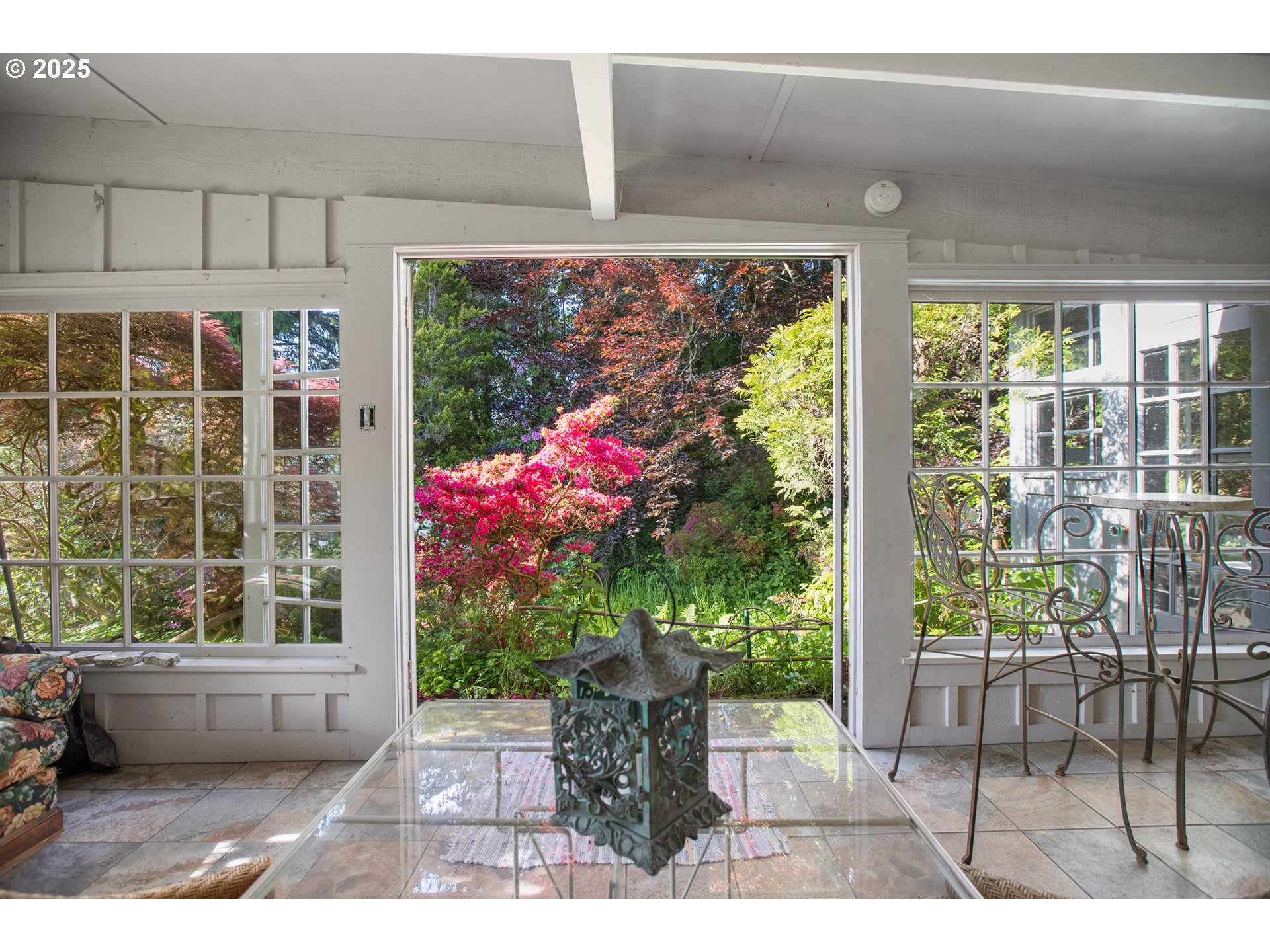 91755 Lewis And Clark Road Astoria, OR 97103 - Photo 31 of 48 a view of a porch with chairs and potted plants