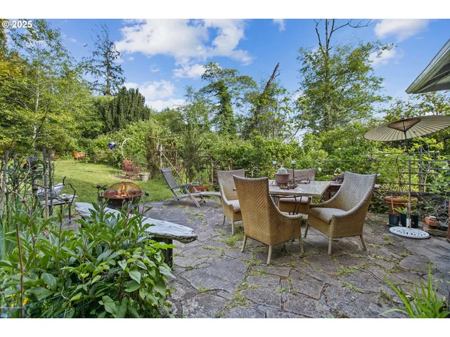 a view of a table and chairs in patio