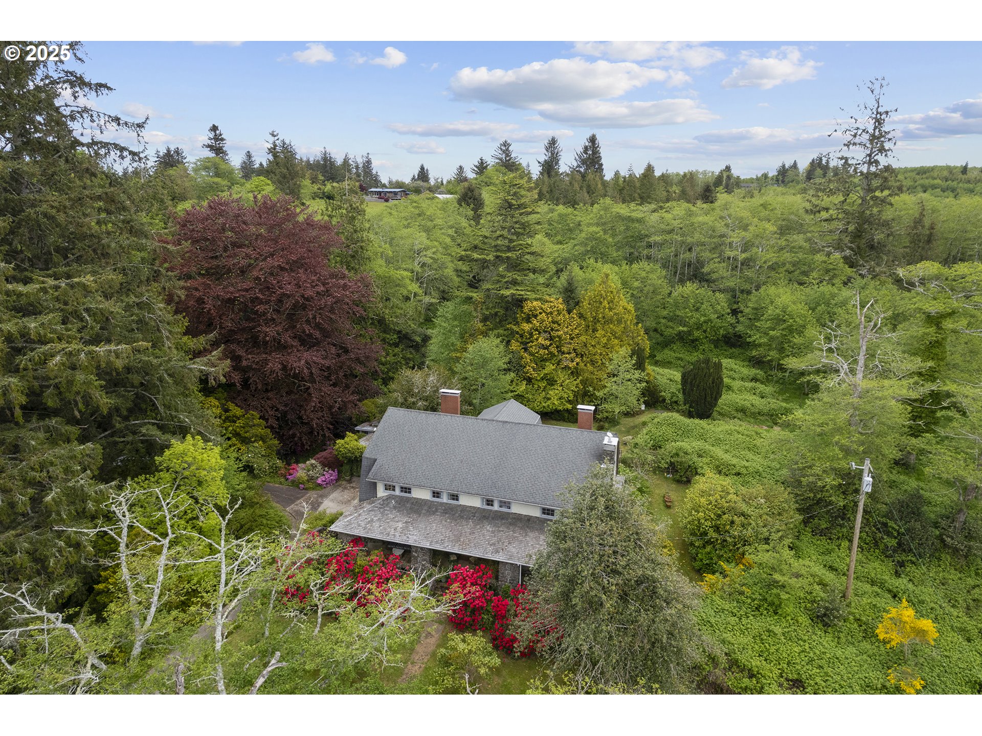 91755 Lewis And Clark Road Astoria, OR 97103 - Photo 43 of 48 an aerial view of a house with a yard