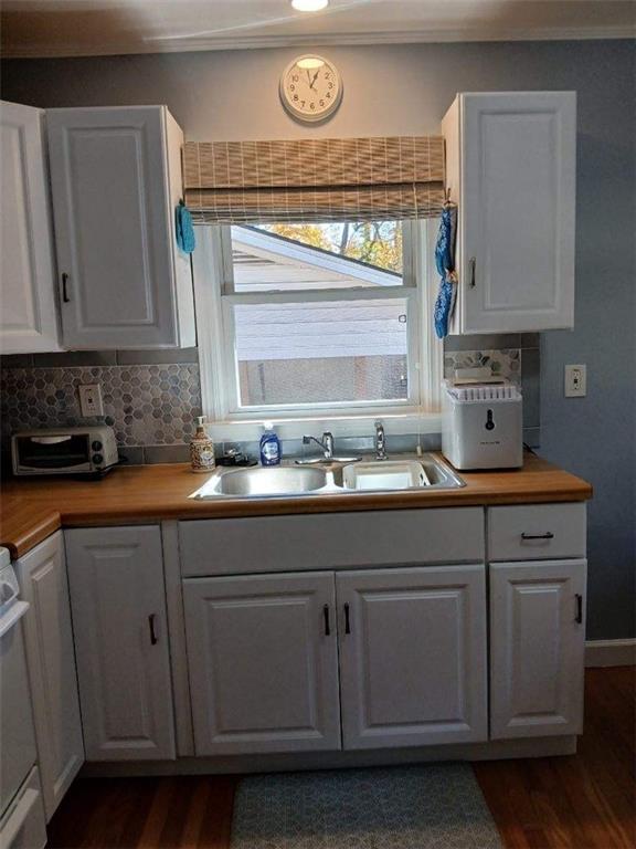 1385 Linkwood Lane Decatur, GA 30033 - Photo 4 of 16 a kitchen with stainless steel appliances granite countertop a sink a stove and cabinets
