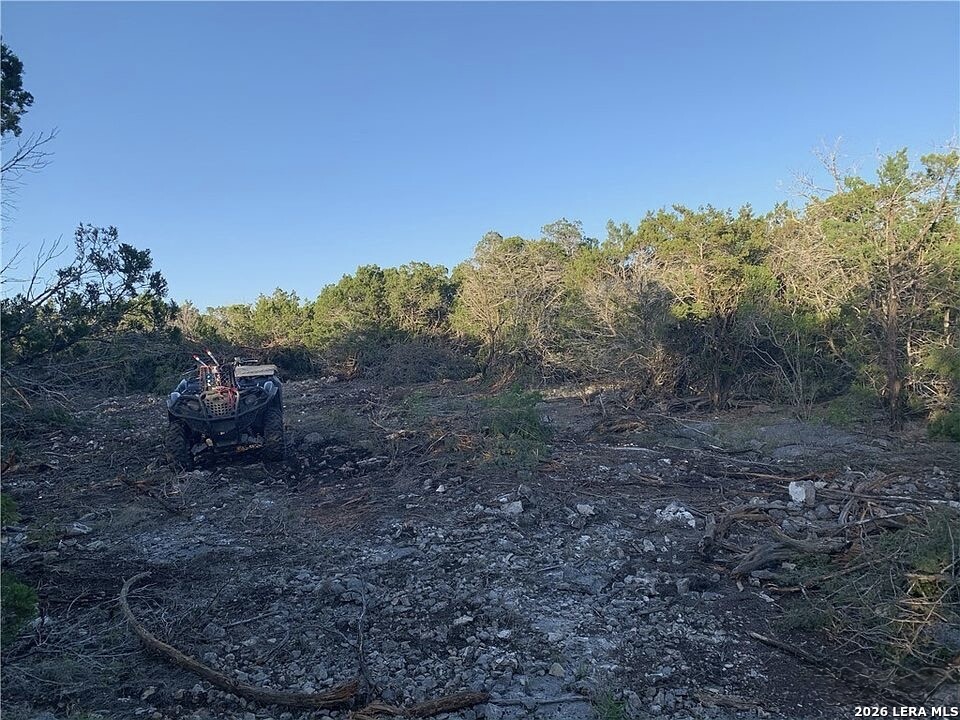 20 WINCHESTER Road Leakey, TX 78873 - Photo 2 of 4 a view of a yard