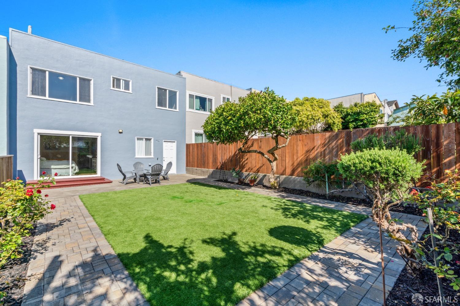 849 Hillside Boulevard Daly City, CA 94014 - Photo 13 of 17 a front view of a house with garden