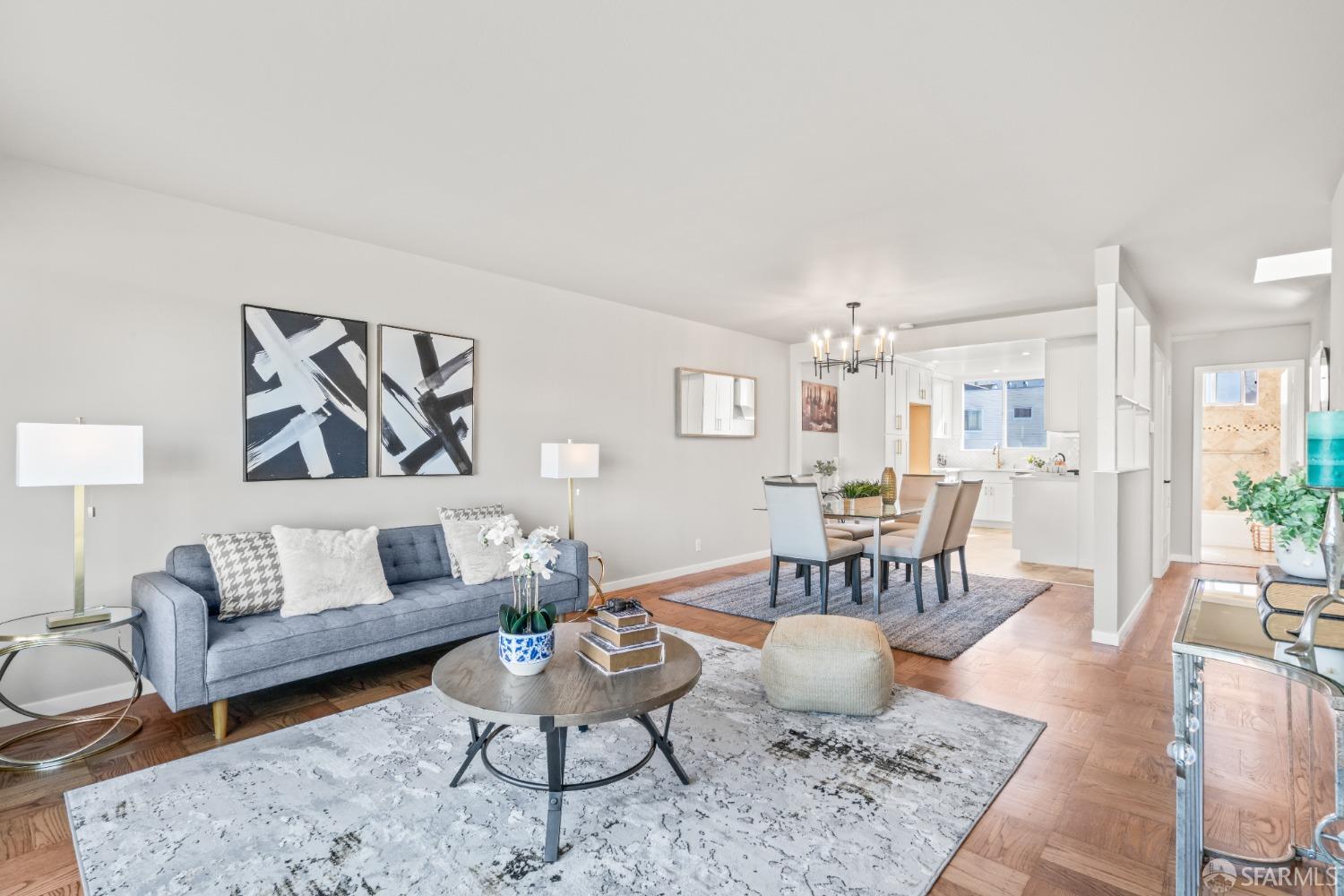 849 Hillside Boulevard Daly City, CA 94014 - Photo 8 of 17 a living room with furniture and wooden floor