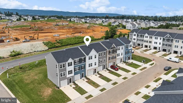 a view of a city with an ocean view