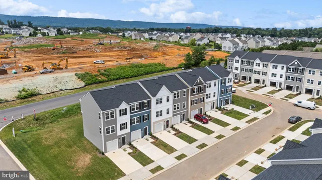 a view of a city with an ocean view