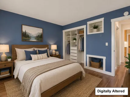 a bedroom with bed and a fireplace