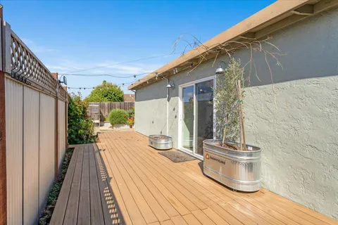 a view of a back yard of the house