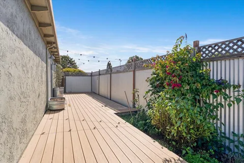 a view of a backyard of the house