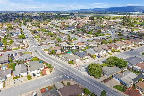 an aerial view of residential building and street
