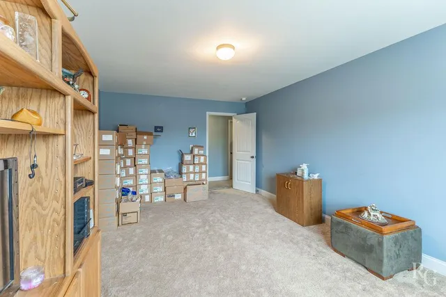 a view of livingroom with furniture and empty room