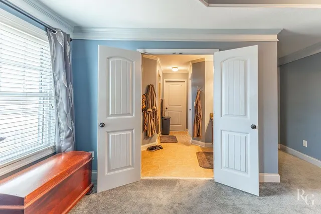 a room with closet and a mirror