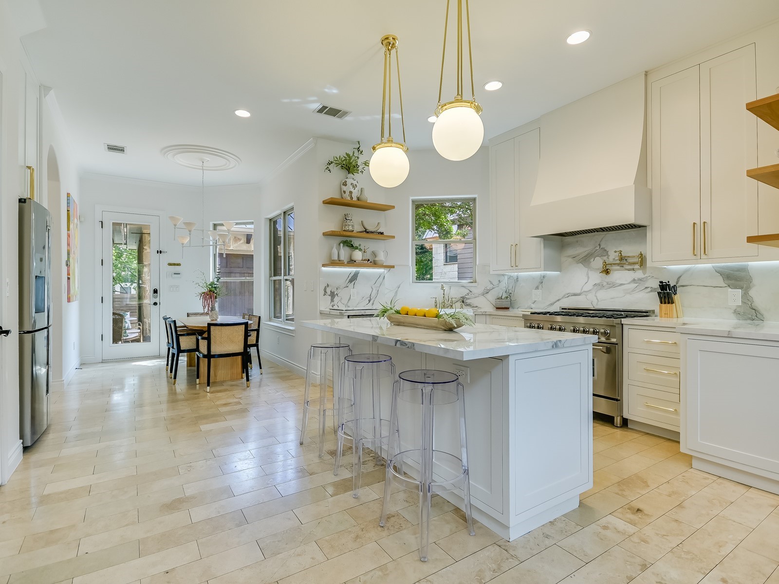 809 Kinney Avenue Austin, TX 78704 - Photo 6 of 21 a kitchen with counter space cabinets and appliances