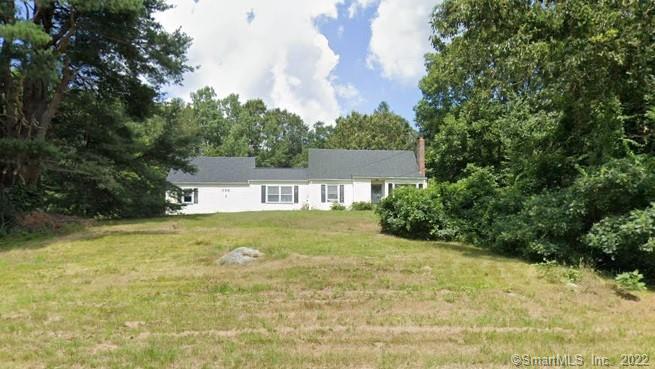 356 Voluntown Road Griswold, CT 06351 - Photo 1 of 1 a view of a house with a yard and plants