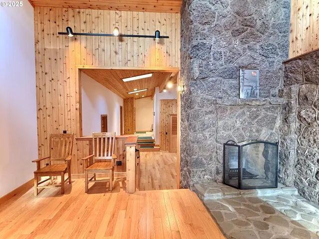 a view of balcony with furniture and floor to ceiling window