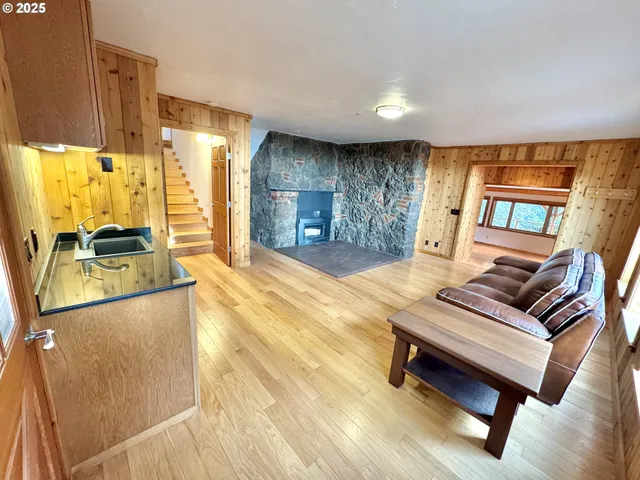 a living room with furniture and a table