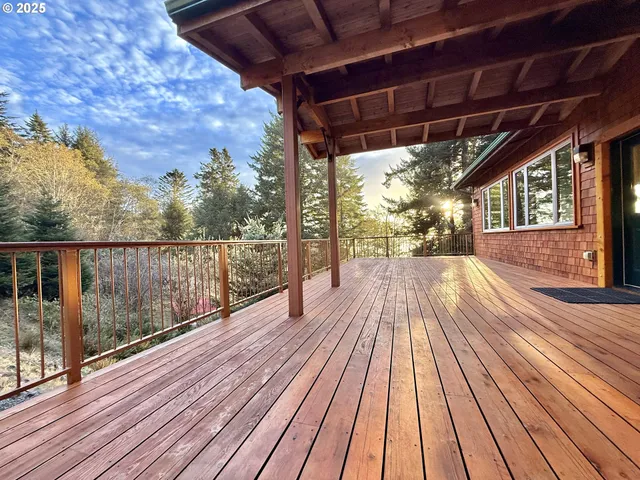 a view of porch with wooden floor