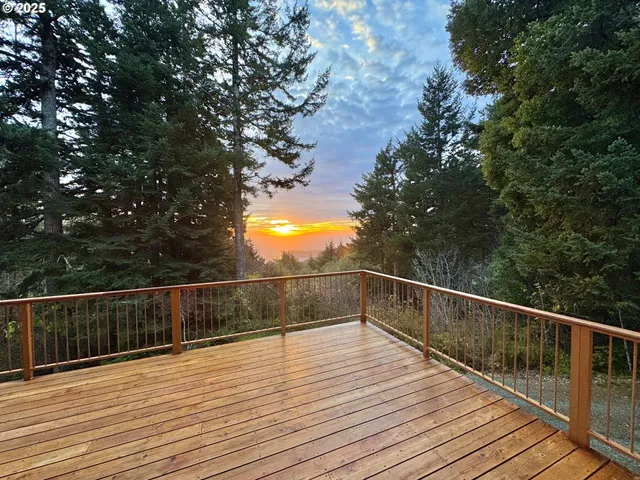 a view of deck with wooden floor and outdoor seating