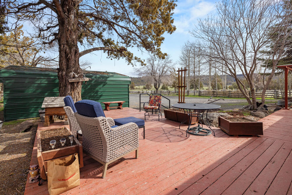 47477 Gerber Road Bonanza, OR 97623 - Photo 47 of 63 a backyard of a house with barbeque oven and outdoor seating