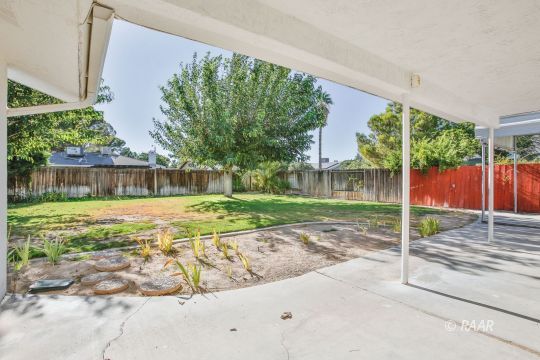 231 South Locust Street Ridgecrest, CA 93555 - Photo 31 of 35 a view of a house with backyard and sitting area