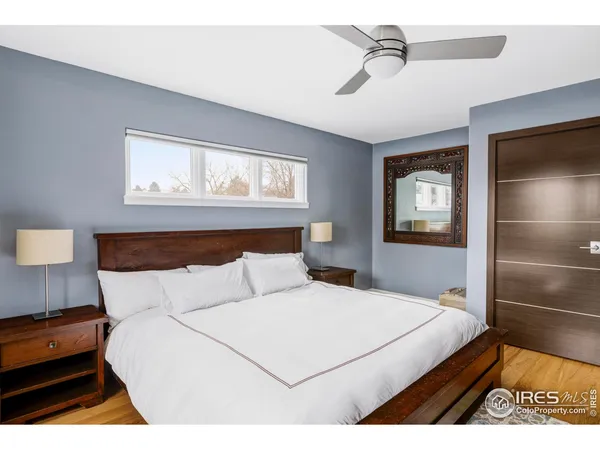 a bedroom with a bed and closet