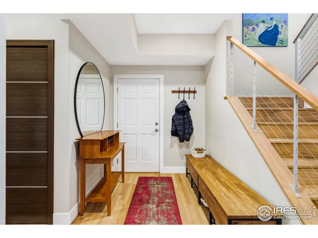 a view of living room with furniture and a rug