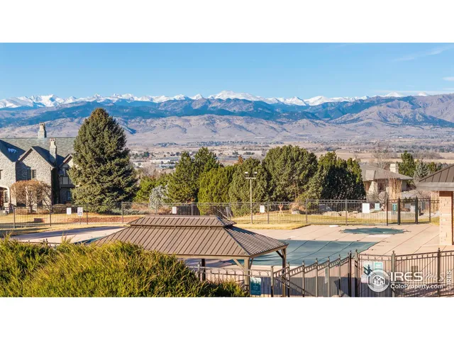 a view of an ocean and a mountain