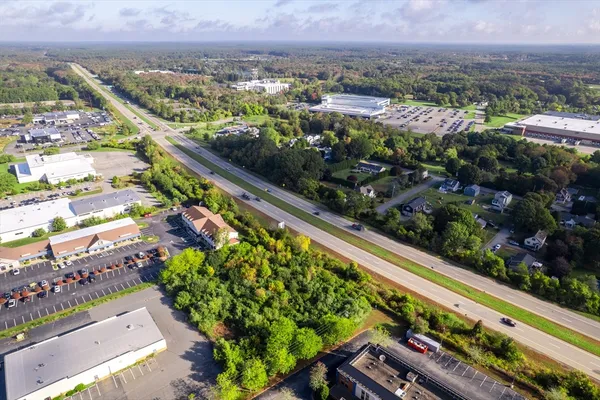 a view of outdoor space with playground and green space