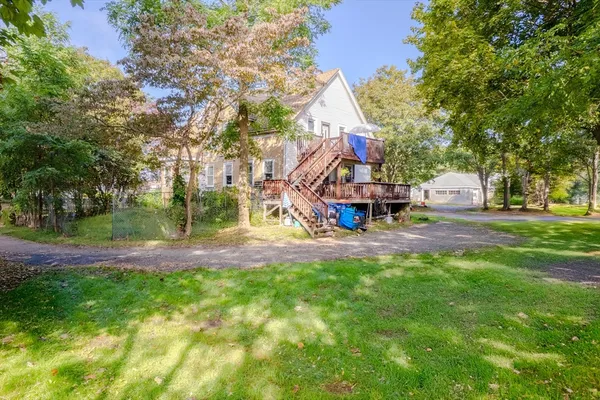 a view of a backyard with a trees