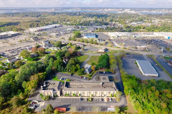 a swimming pool is sitting in the middle of a lake