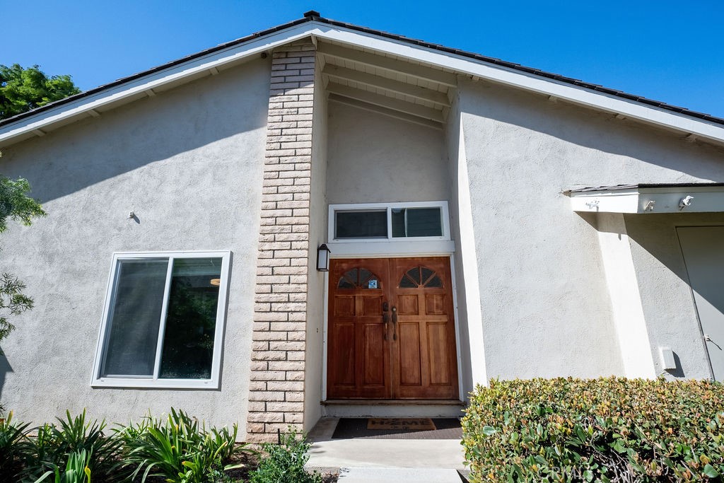 13 Brookmont, Unit 60 Irvine, CA 92604 - Photo 15 of 24 a front view of a house