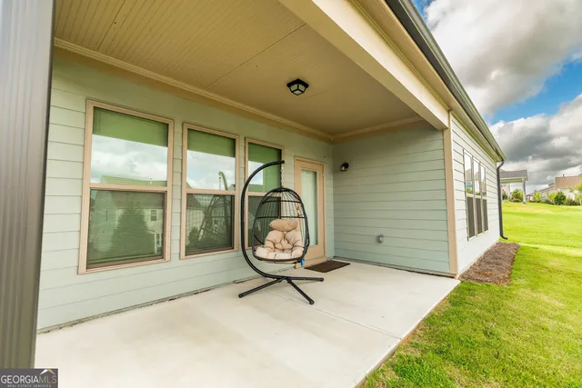 a view of a house with a garden