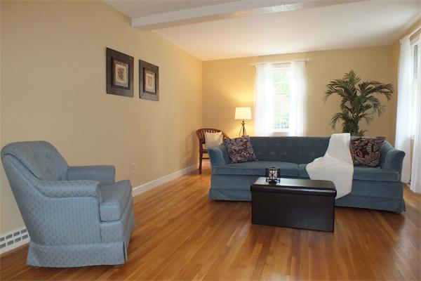 1 Blacksmith Road Chelmsford, MA 01824 - Photo 14 of 29 a living room with furniture and a wooden floor