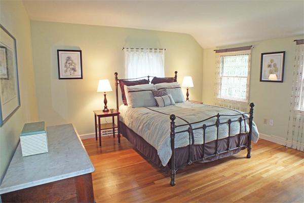 1 Blacksmith Road Chelmsford, MA 01824 - Photo 15 of 29 a bedroom with a bed and wooden floor