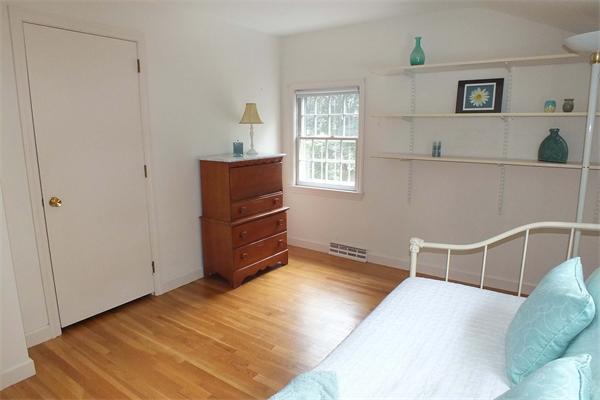 1 Blacksmith Road Chelmsford, MA 01824 - Photo 21 of 29 a bedroom with a bed and a window