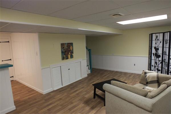 1 Blacksmith Road Chelmsford, MA 01824 - Photo 25 of 29 a living room with furniture and wooden floor