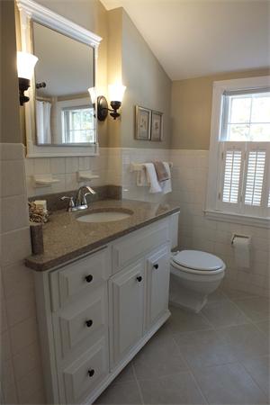 1 Blacksmith Road Chelmsford, MA 01824 - Photo 27 of 29 a bathroom with a granite countertop toilet sink and mirror