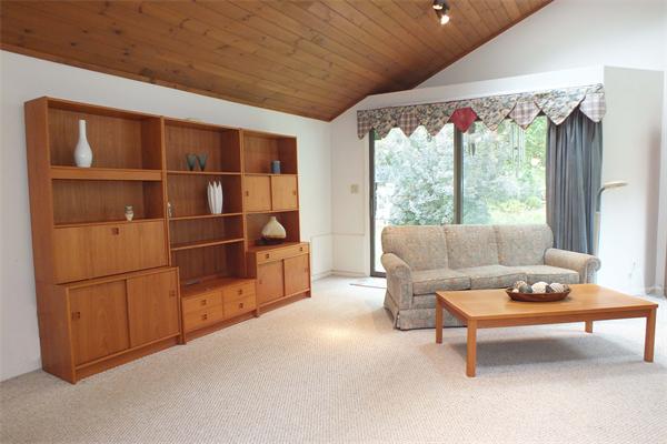 1 Blacksmith Road Chelmsford, MA 01824 - Photo 5 of 29 a living room with furniture a window and a table