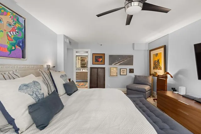 a bedroom with bed and furniture