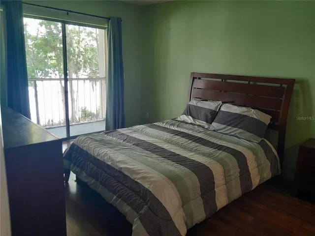 a view of a hallway with windows