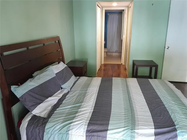 a view of house with a yard