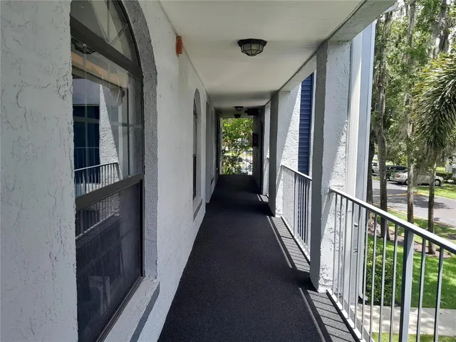 a workspace with wooden floor and a cabinet