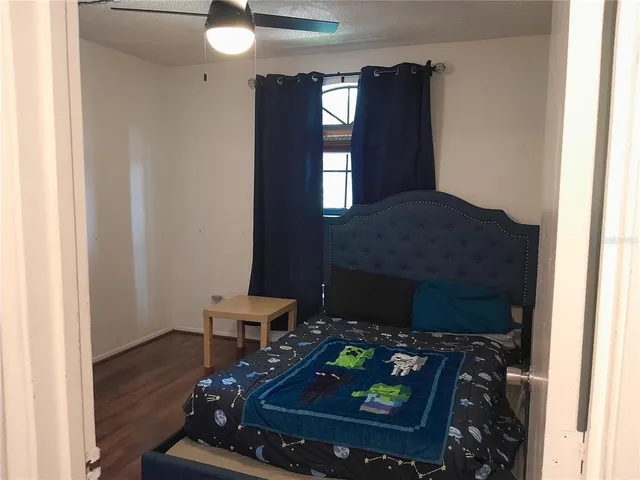 a view of a wooden deck and a lake view