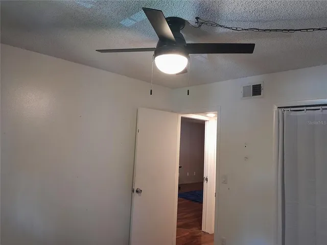 a view of a wooden deck with a bench