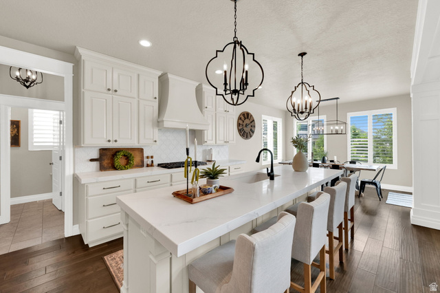 1132 South 1300th Street West Mapleton, UT 84664 - Photo 9 of 52 Spacious kitchen with a central island featuring a built-in sink and seating