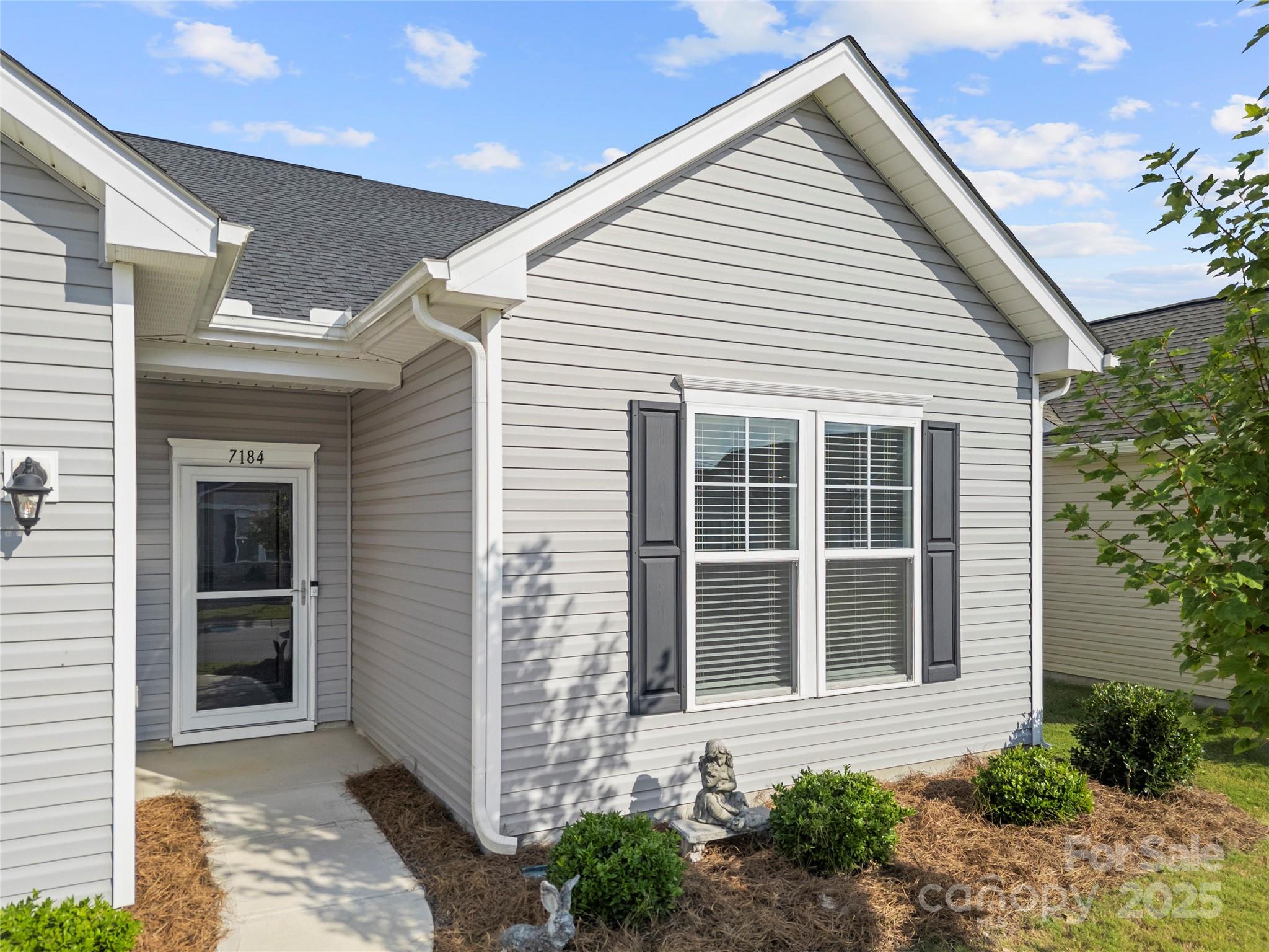 7184 Indigo Way Denver, NC 28037 - Photo 2 of 41 a view of a house with a yard