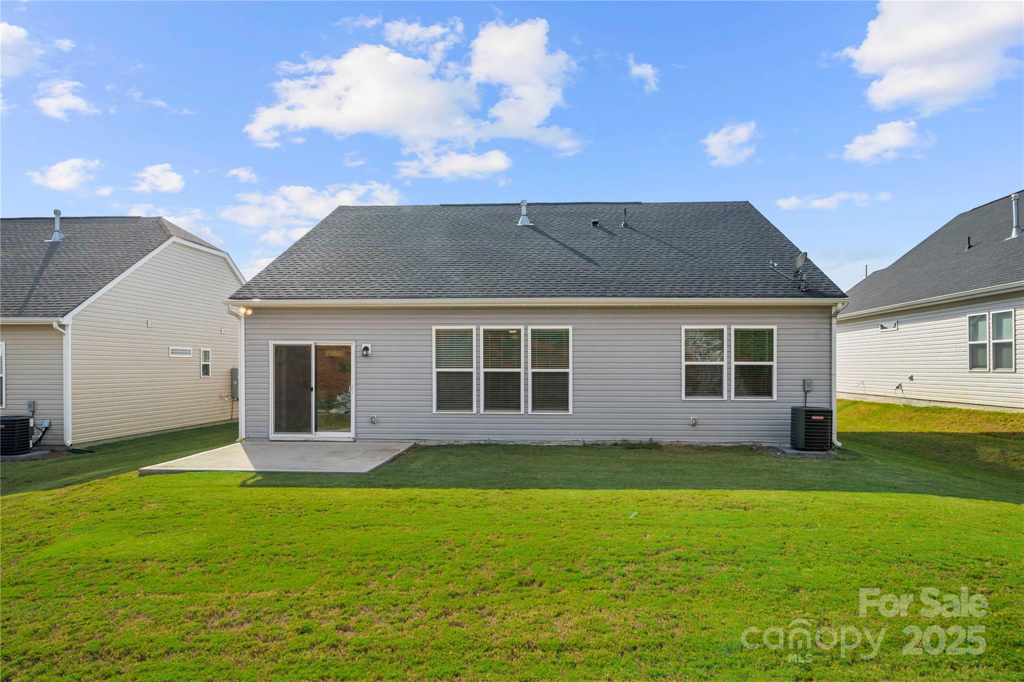 7184 Indigo Way Denver, NC 28037 - Photo 34 of 41 a front view of house with yard and green space