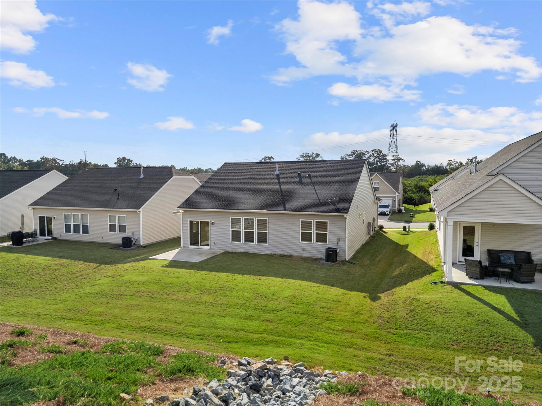 7184 Indigo Way Denver, NC 28037 - Photo 37 of 41 a front view of a house with a garden