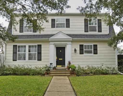 front view of a house and a yard