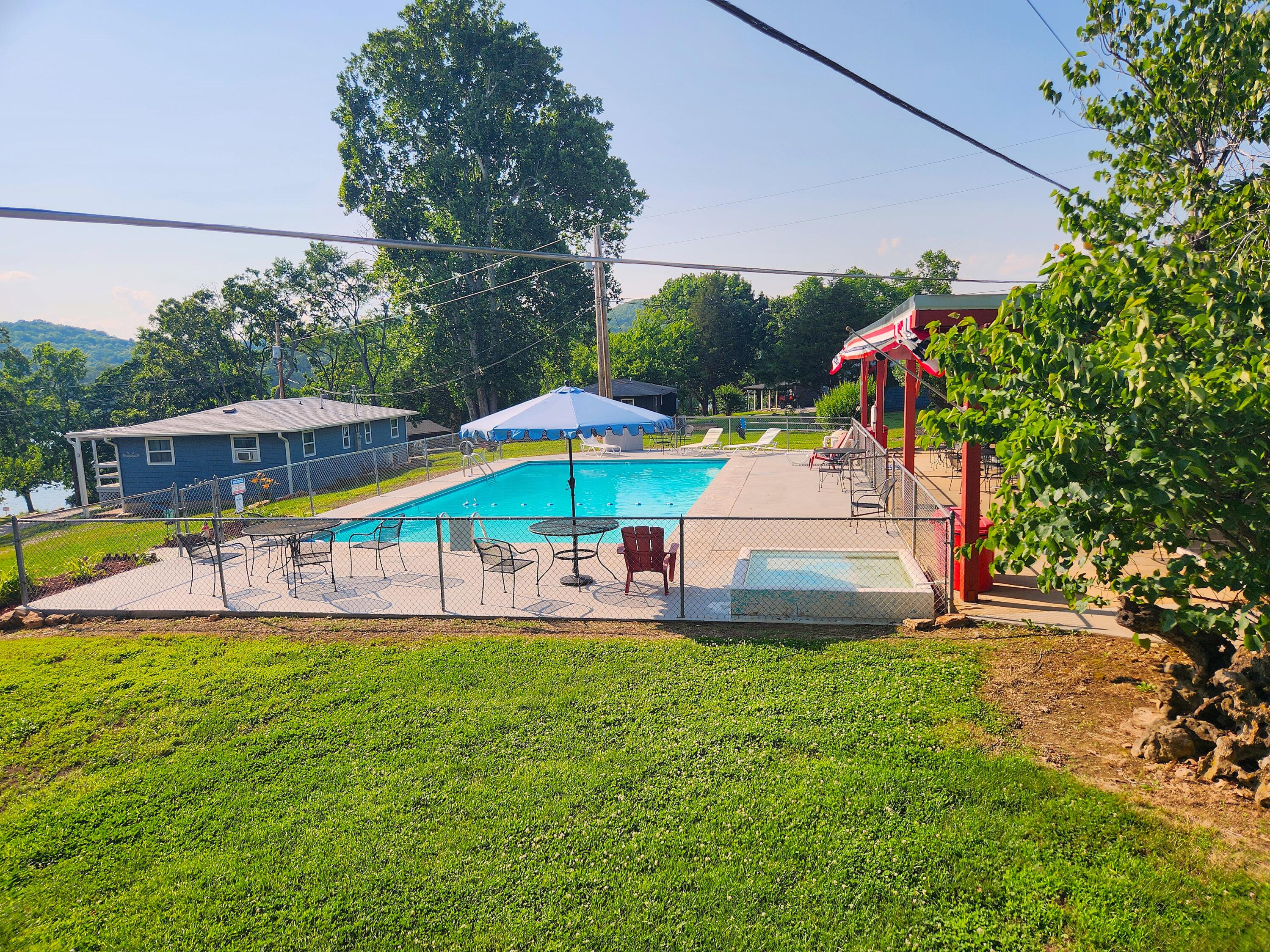 98 Holiday Hideaway Court, Unit 1 & 2 Reeds Spring, MO 65737 - Photo 38 of 46 HH Pool Pic