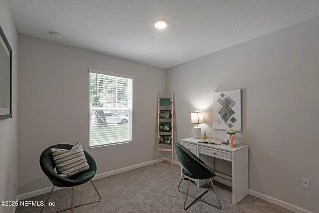 a room with furniture and a window